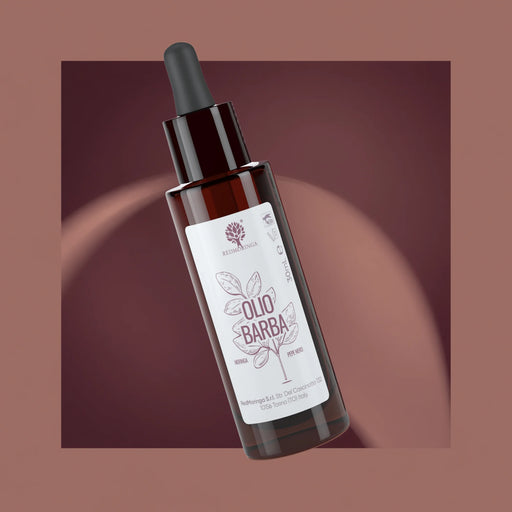 Dropper bottle of RedMoringa Beard Oil with Moringa, argan, jojoba and macadamia on a burgundy background