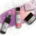 Los cuatro cosméticos del Set Regalo Moringa Beauty RedMoringa sobre una lluvia de purpurina morada