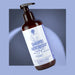 Flacone con dosatore dello Shampoo Antiforfora bio RedMoringa alla Moringa con estratti di malva, nasturzio e ortica
