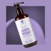 Shampoo antigiallo naturale RedMoringa con Moringa, camomilla e malva, flacone con dosatore su sfondo lilla