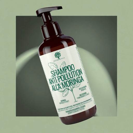RedMoringa Moringa Anti-Pollution shampoo with argan oil and pomegranate, pump bottle on a green background